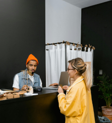 customer paying at consignment store using pos